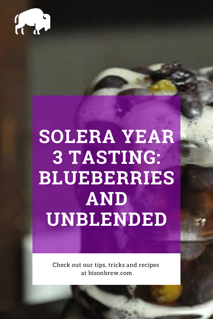 Blueberries coming out of a carboy from a solera brewed beer