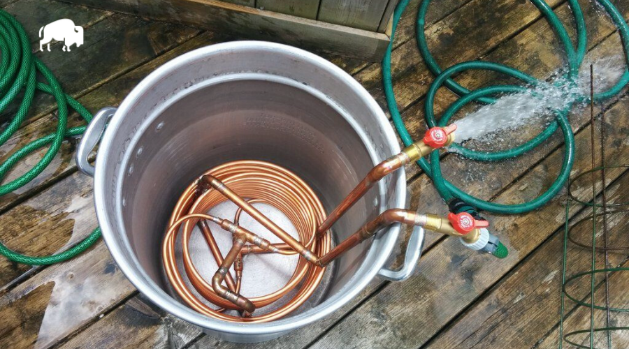 wort chiller in a boil kettle with a hose connected to one end